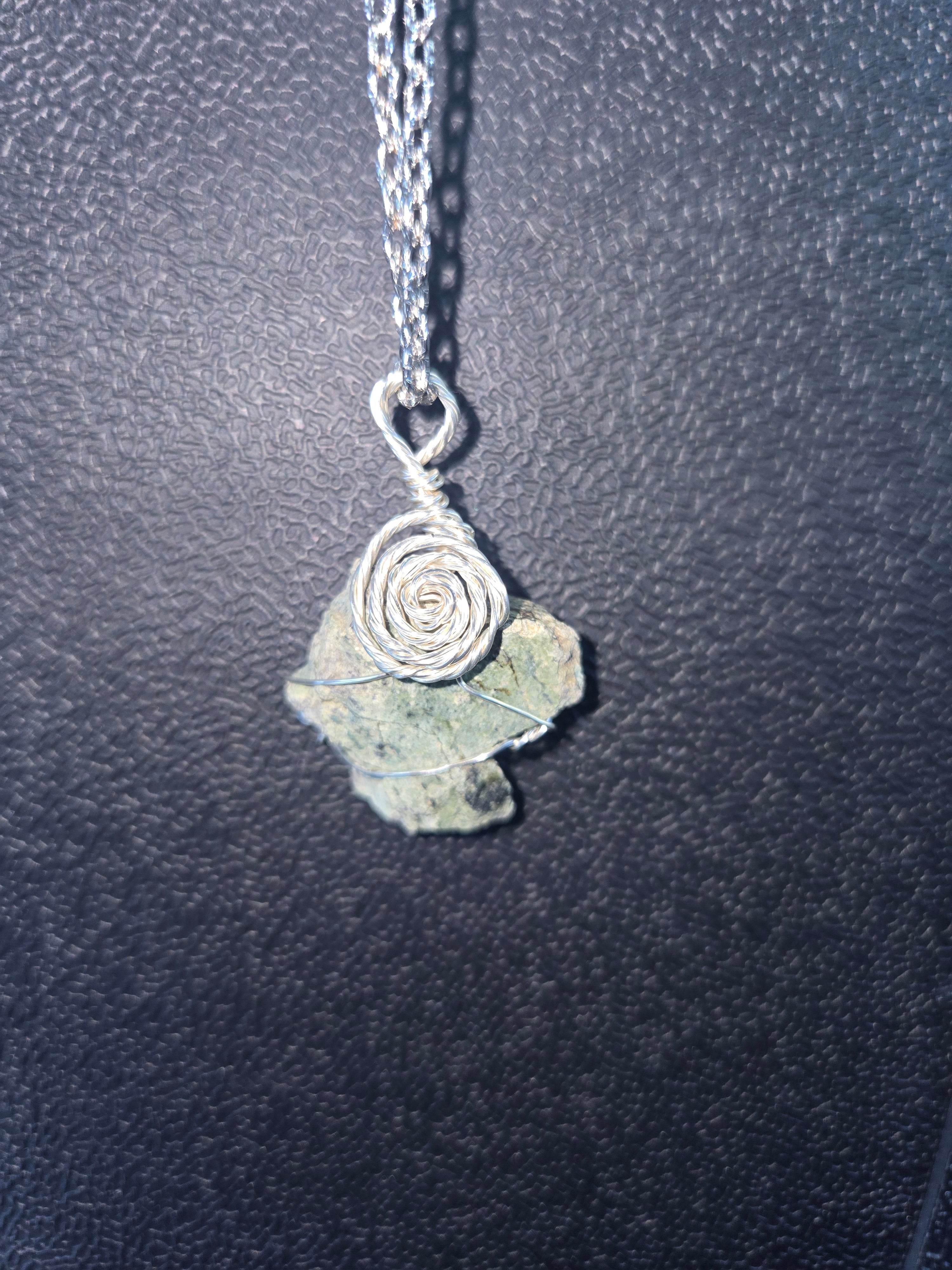 Silver wire wrapped Serpentine Stone