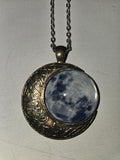 Moon pendant on a 24-in chain