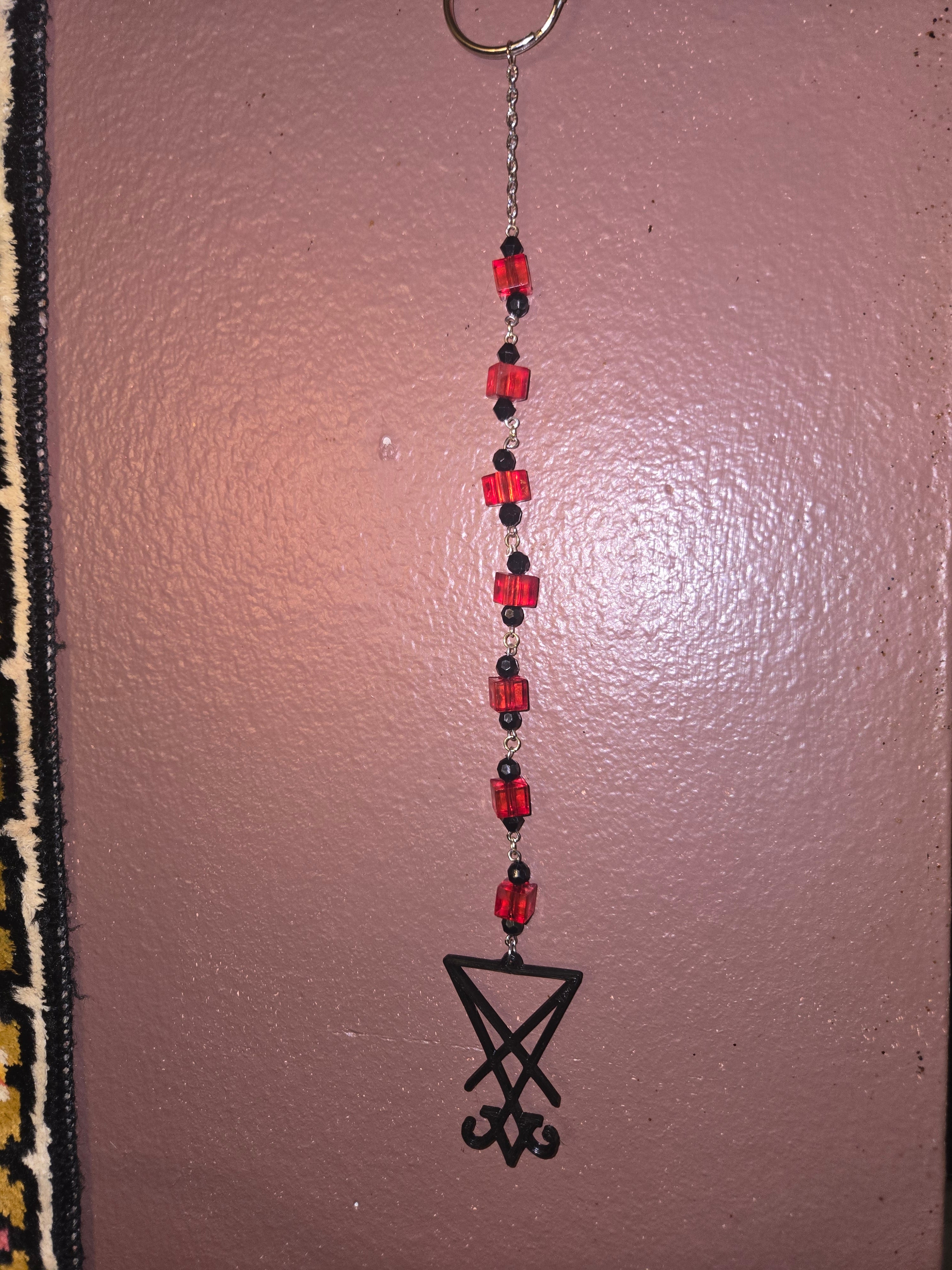 Red and Lucifer sun catcher