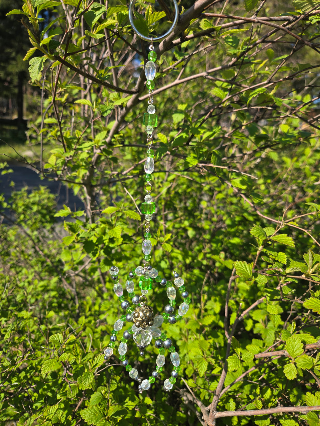 Green and clear spider sun catcher