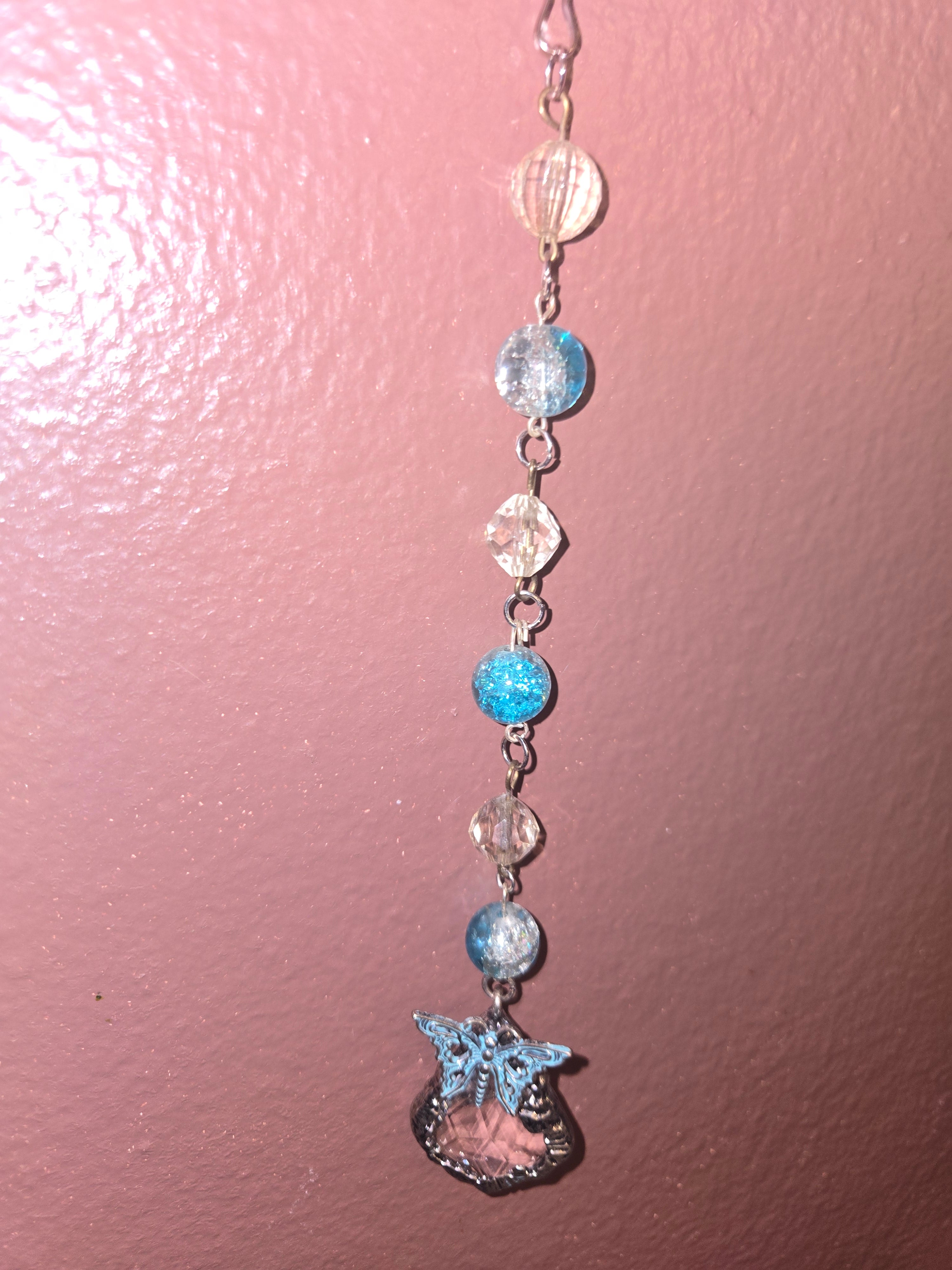 Butterfly Crystal sun catcher with teal crackle glass beads